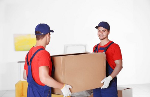 Local moving team planning a Sutton collection route