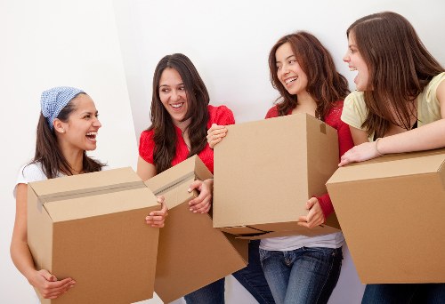 Packed boxes and furniture ready for Sutton removal services