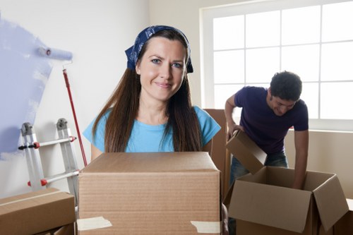 Careful unloading of household items at a Sutton property