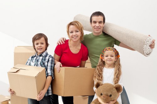 Boxes and furniture being loaded for a move in Sutton