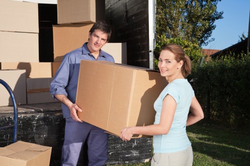 Removal team loading items for a local move in Sutton